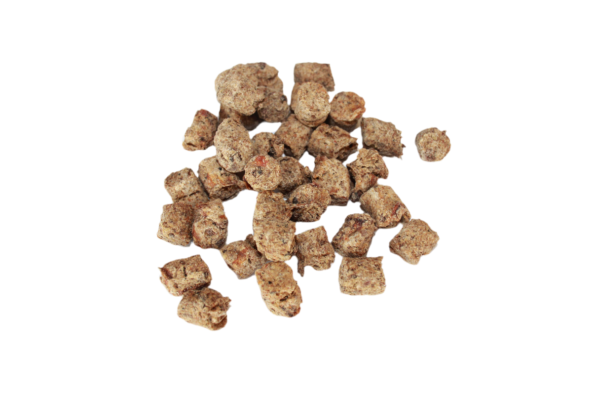 Krokante hert drops voor honden met 80% hertenvlees en 20% ontsloten maïs, geschikt als trainingssnack of beloning.