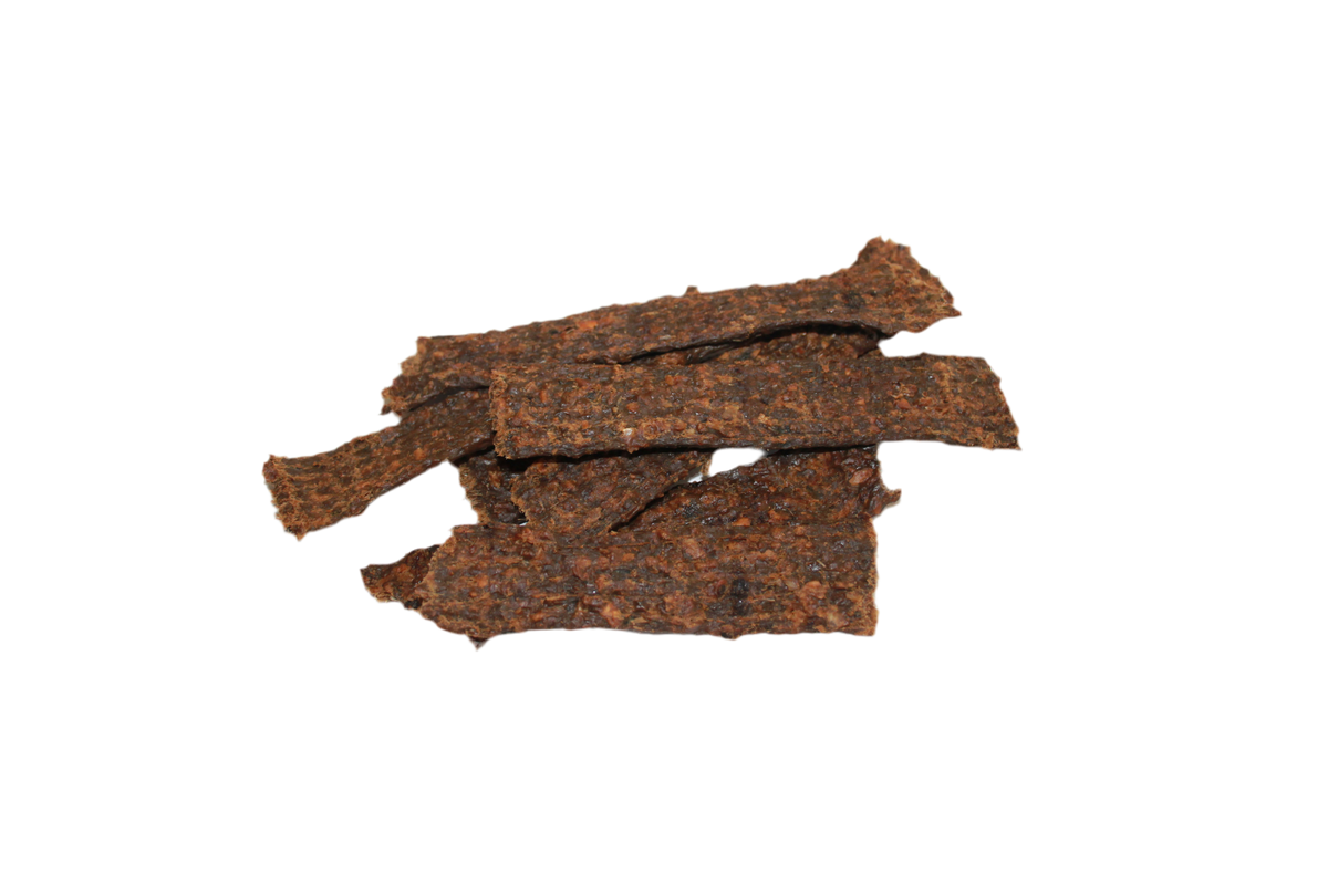 Zachte vleesstrips van 100% vis voor honden, makkelijk in stukjes te breken en geschikt als beloning voor kleine honden en senioren.